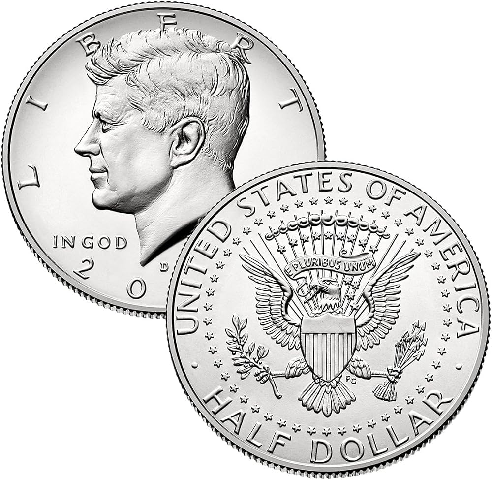 2002 Kennedy half dollar grading comparison strip from worn to gem uncirculated condition